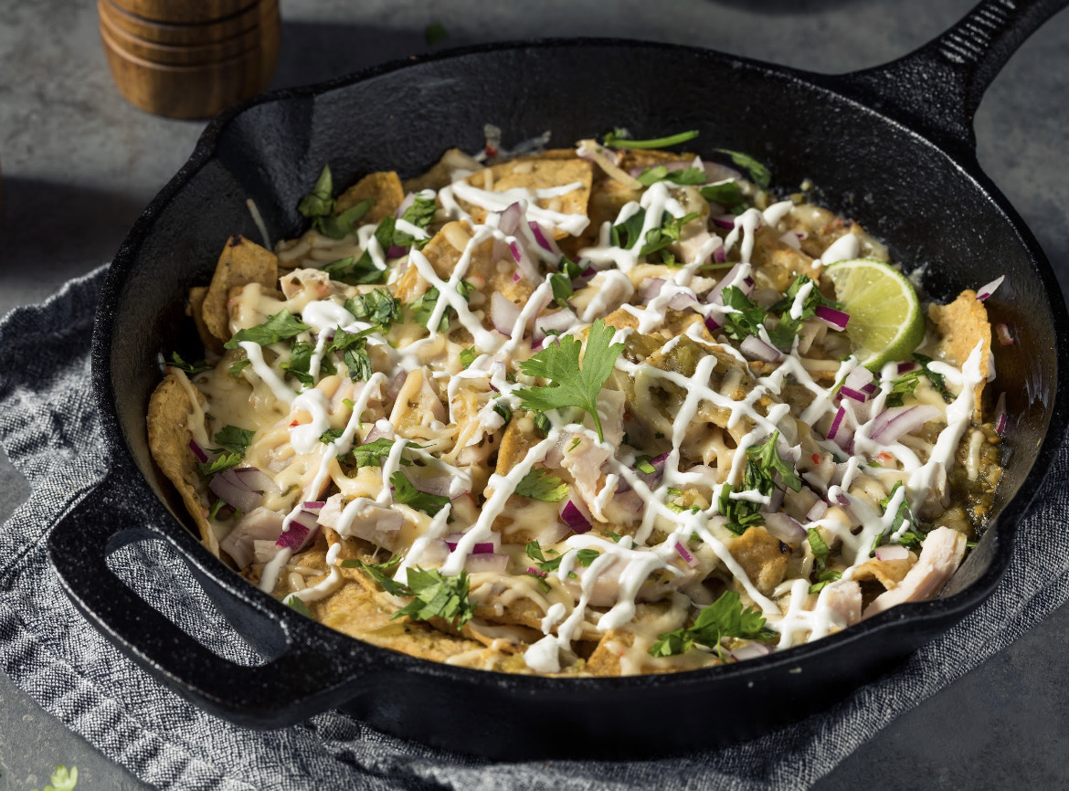 Los Chilaquiles: Explorando la Historia del Desayuno Perfecto Mexicano